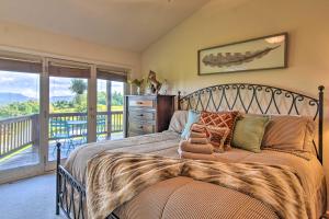 a bedroom with a large bed with a balcony at High Gravity Banner Elk Custom Chalet with Views! in Banner Elk