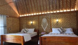 Voodi või voodid majutusasutuse Ocean View Villas toas