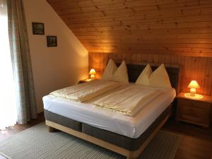 Postel nebo postele na pokoji v ubytování Gerstbreinhof
