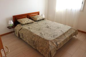 Postel nebo postele na pokoji v ubytování Gîte des Dodos