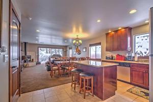 a kitchen and dining room with a table and chairs at Cozy Incline Village Townhome 2 Mi to Ski Beach in Incline Village
