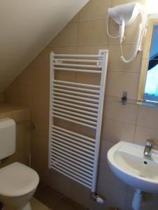 Kúpeľňa v ubytovaní Első Fecske apartmanok