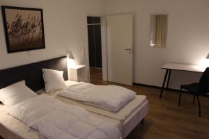 Katil atau katil-katil dalam bilik di Dünenhaus Wohnung 13