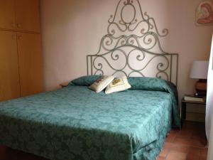 Postel nebo postele na pokoji v ubytování Podere Il Mulino