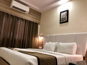 Hotel Avon Ruby Dadar 객실 침대