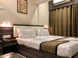 Hotel Avon Ruby Dadar 객실 침대
