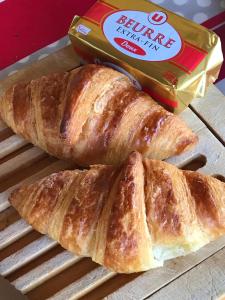 three loaves of bread and a bag of butter at Domaine de Peilhan in Roujan +31 photos