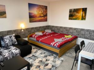 Postel nebo postele na pokoji v ubytování Apartman Nikola Trojanovice