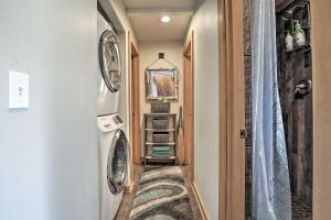 a hallway with a washer and dryer in a house at Private Rockaway Beach Retreat 2 Blocks to Ocean! in Rockaway Beach
