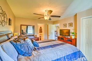 a bedroom with a bed and a ceiling fan at Myrtle Beach Oasis on River Oaks Golf Course! in Myrtle Beach