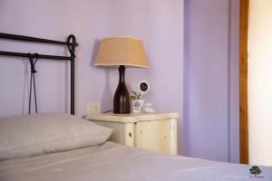 A bed or beds in a room at Ca' le cerque, villa surrounded by the Marche nature