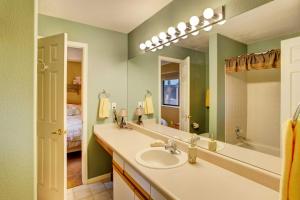 a bathroom with a sink and a mirror at Private Hot Tub and Deck Breckenridge Abode! in Breckenridge +16 photos