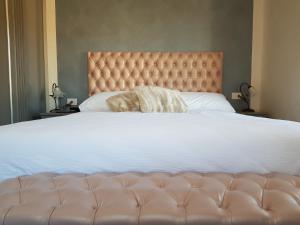Postel nebo postele na pokoji v ubytování Villa Ciardi Wellness Hotel & Ristorante
