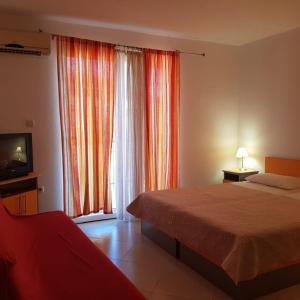 Cama o camas de una habitación en Apartments Galija
