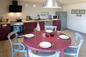 Kuchyň nebo kuchyňský kout v ubytování Appartement La Haute Preze & Golffrance