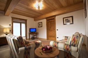TV a/nebo společenská místnost v ubytování Ca' Premuda Locazione Turistica