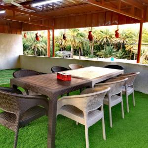 Zahrada ubytování Sehma Guest House بيت السحمه للضيافه + 37 fotografií