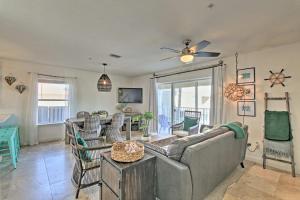 a living room with a couch and chairs at Emerald Hideaway Renovated Condo in Navarre Beach in Navarre