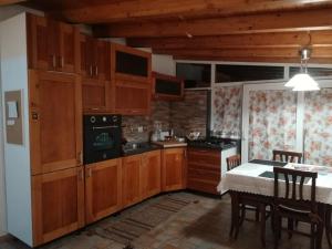 A kitchen or kitchenette at La Terrazza sul Centro