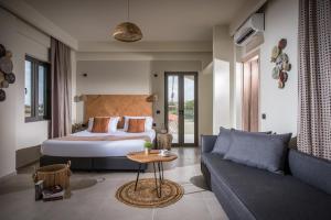 Cama ou camas em um quarto em Malena Hotel & Suites - Adults Only by Omilos Hotels
