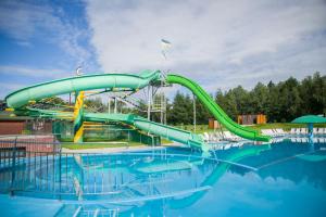 a water slide in a swimming pool at Shepilska Relax Complex in Dolgoluka