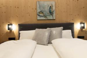 Letto o letti in una camera di Wally Berg-Appartements
