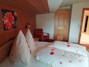 Łóżko lub łóżka w pokoju w obiekcie Ferienwohnung Angererhof