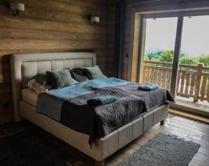 A bed or beds in a room at Chata Čerenka