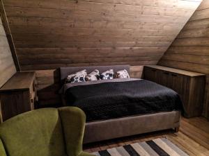 A bed or beds in a room at Chata Čerenka