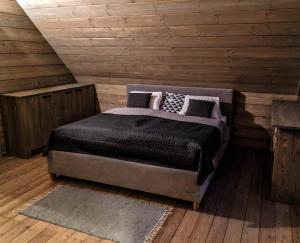 A bed or beds in a room at Chata Čerenka
