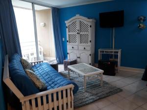 TV a/nebo společenská místnost v ubytování Edificio Costa del Este - Resort