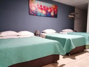 Postel nebo postele na pokoji v ubytování Kayva