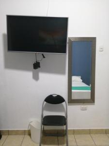 TV a/nebo společenská místnost v ubytování Kayva