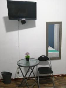 TV a/nebo společenská místnost v ubytování Kayva + 37 fotografií