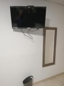 TV a/nebo společenská místnost v ubytování Kayva