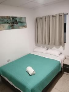 Postel nebo postele na pokoji v ubytování Kayva