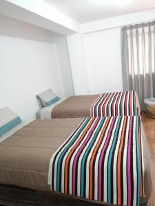 Postel nebo postele na pokoji v ubytování Casa ValPer
