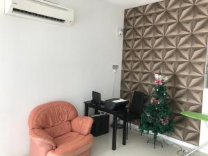 Posezení v ubytování Island Hostel Bayan Lepas Airport
