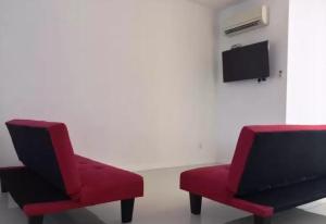 TV a/nebo společenská místnost v ubytování Island Hostel Bayan Lepas Airport