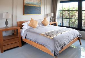 Кровать или кровати в номере Casa Narrow Villa