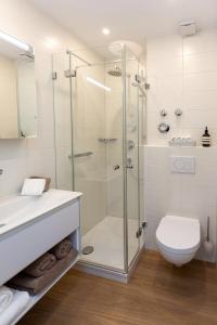 Ванна кімната в Alpen-Ferienwohnung Ginova