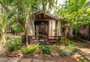 una piccola casa in mezzo a una foresta di Simrose ad Agonda