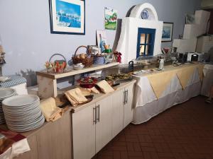Kuchyň nebo kuchyňský kout v ubytování Mediterranean Blue