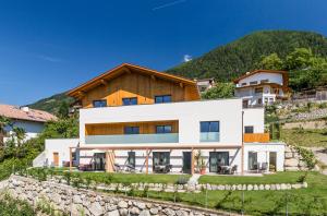 a house on the side of a mountain at Beim Dorner in Schenna