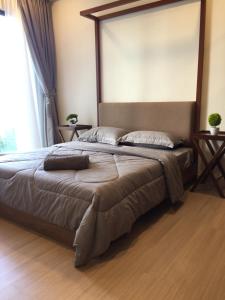 Katil atau katil-katil dalam bilik di Timurbay Seafront Seaview & Poolview Suite with Wi-Fi