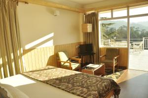 Postel nebo postele na pokoji v ubytování Vatsalyam Home Stay + 37 fotografií