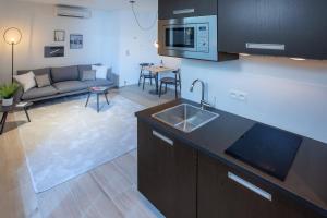 Köök või kööginurk majutusasutuses Qstay Good Living Apartments
