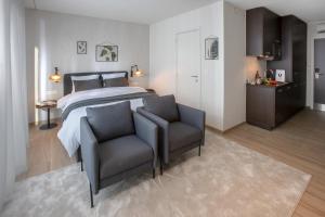 Voodi või voodid majutusasutuse Qstay Good Living Apartments toas