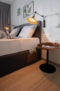 Voodi või voodid majutusasutuse Qstay Good Living Apartments toas