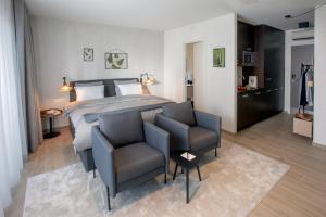 Voodi või voodid majutusasutuse Qstay Good Living Apartments toas +29 fotot